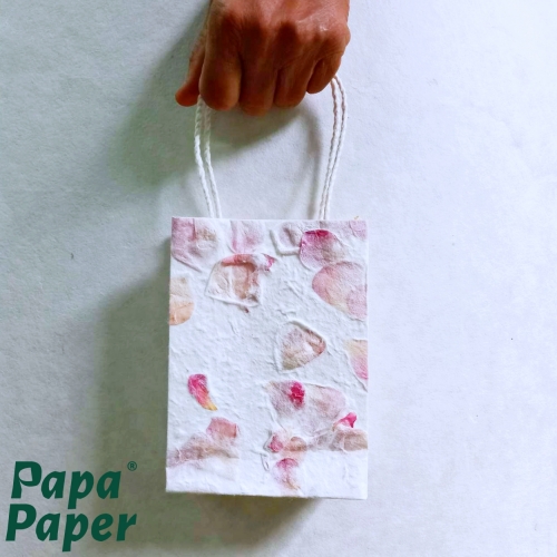 Paper bag with rose leaves
